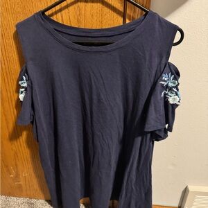 Woman Within Navy Top with Floral Accents